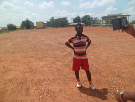 A young boy training .